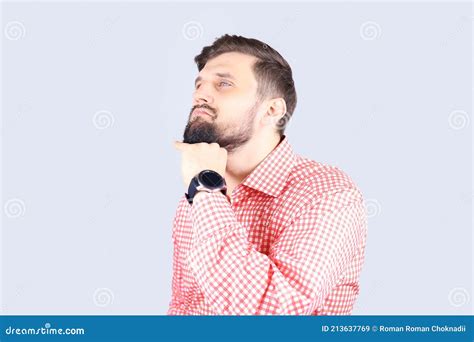 <b>Guy</b> at work will <b>stroke</b> <b>his</b> slightly long <b>beard</b> <b>while</b> I'm casually conversing with him, specifically when he's <b>talking</b>. . What does it mean when a guy strokes his beard while talking to you